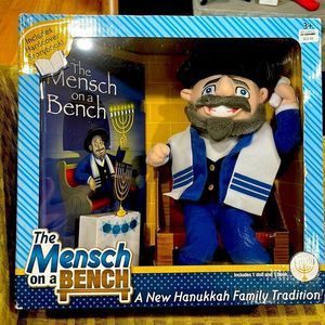 Mensch on a bench Hanukkah toy